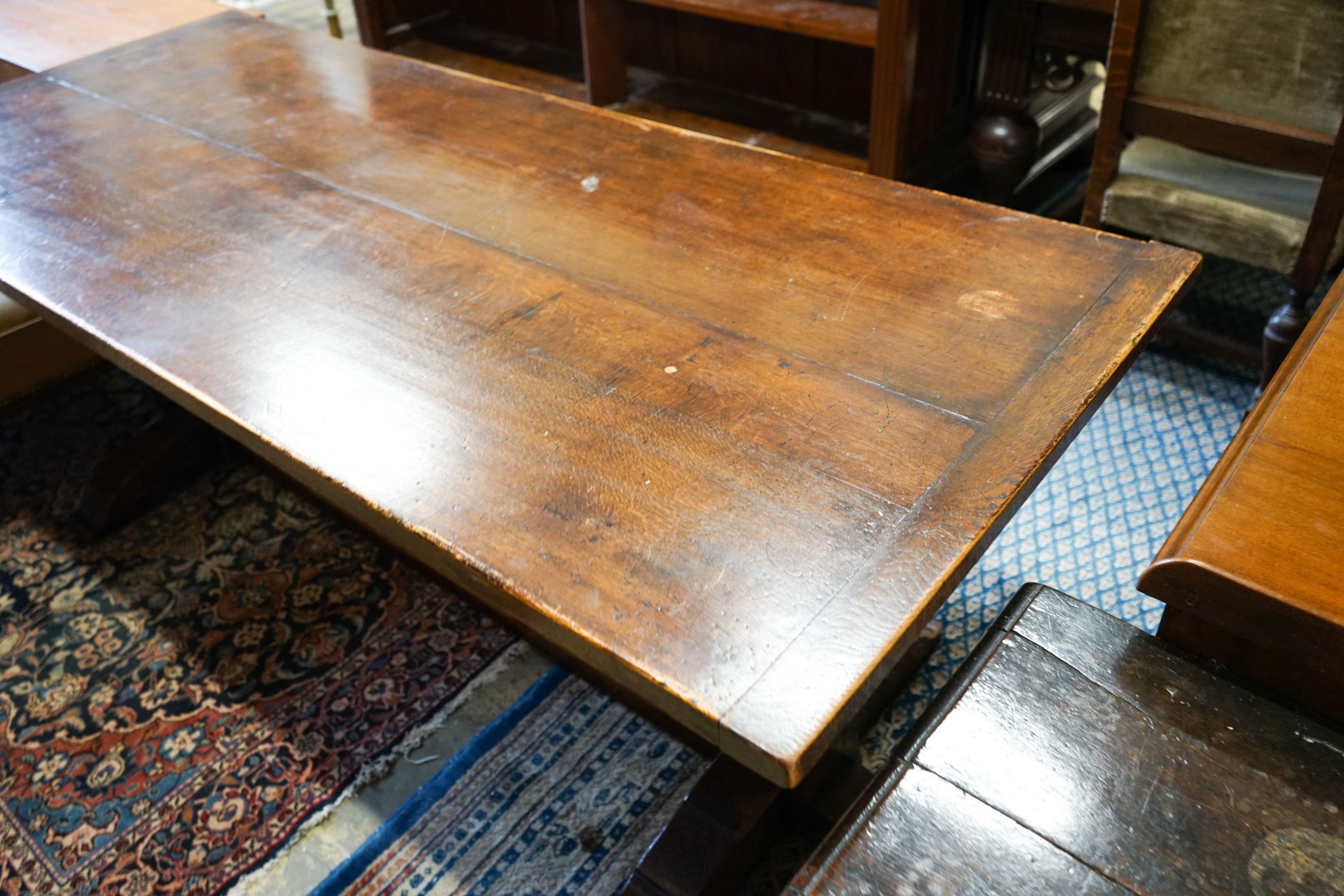 A 17th century style carved rectangular oak refectory table